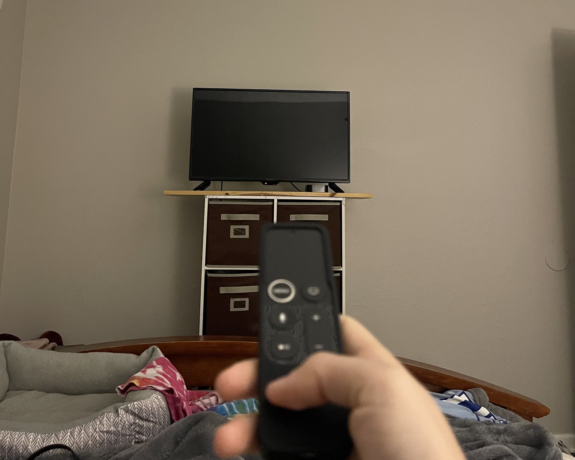 tv and pointing a remote to tv